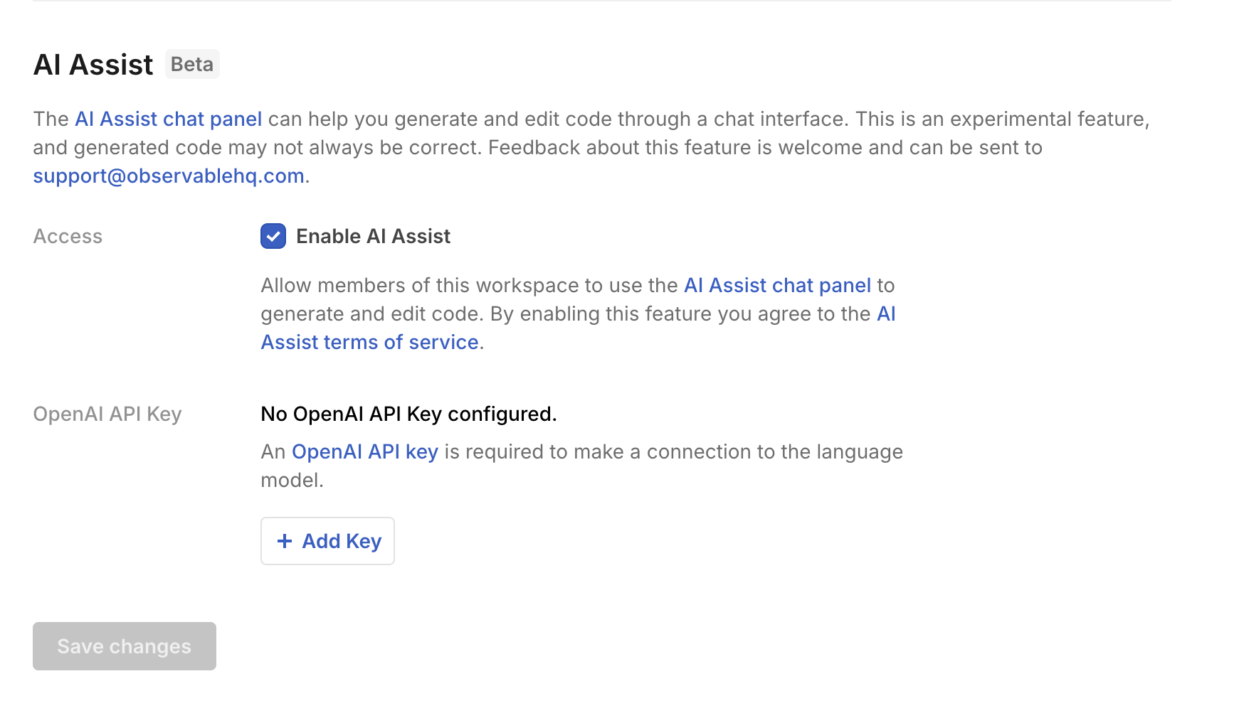 A screenshot of the Settings page scrolled down to the AI Assist section and showing the Enable AI Assist option selected and highlighted with a red rectangle outline overlay around it and the option to add an API key which is also highlighted with a red rectangle overlay.