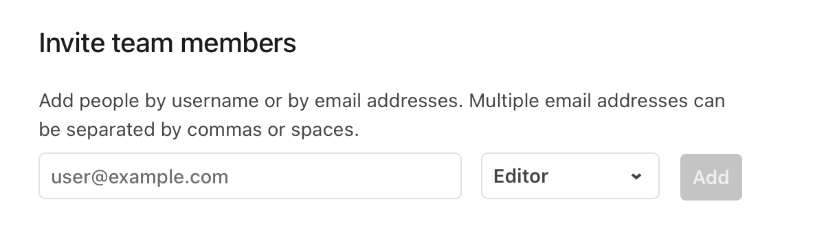 The Invite workspace members dialog, with an input field for the email and a drop-down for the role.